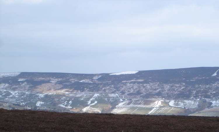 Cold Moor in the snow. Note the white patches where the snow has fallen onto recently burnt areas in the heather.