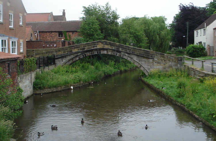 A view along the River Leven as it runs behind the main street of Stokesley 